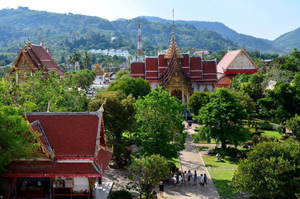 Wat Chalong temple with ornate roofs and golden decorations