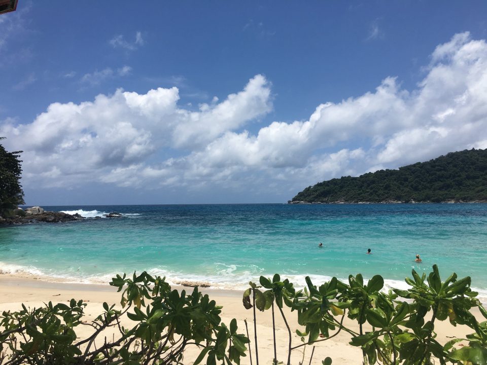 Freedom Beach with pristine white sand and clear water