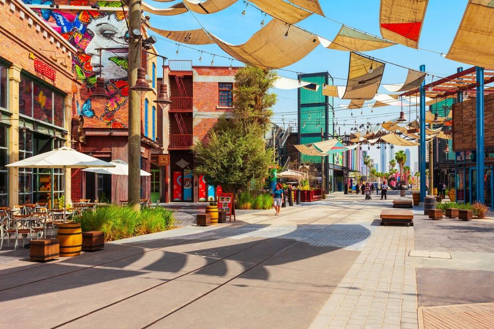 Colorful beach installations and cafes at La Mer beach district
