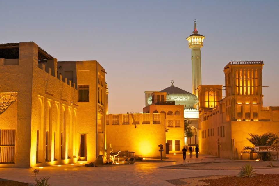 Narrow alleyway with traditional wind-tower houses in Bastakiya