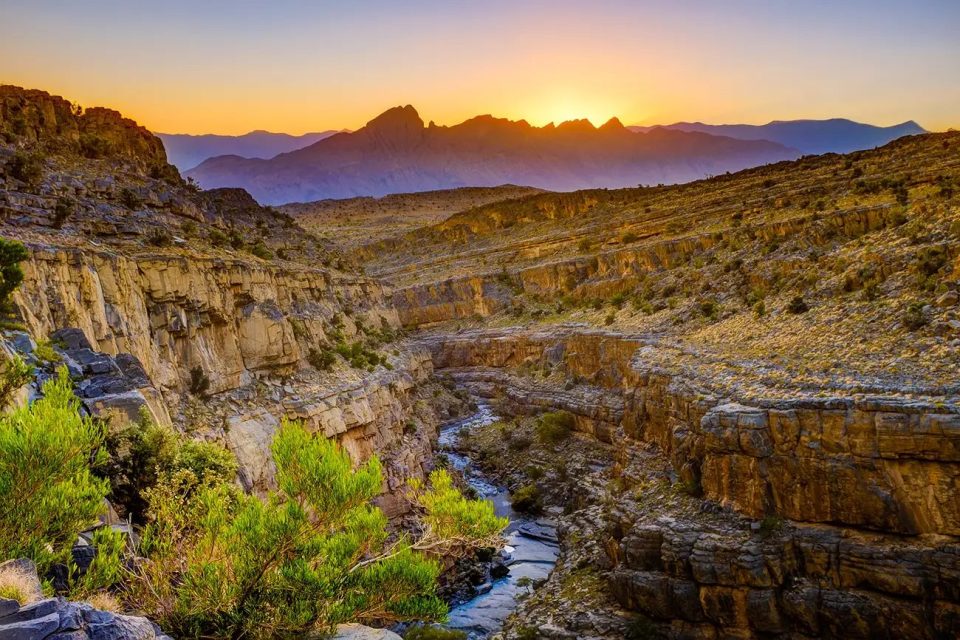 A rugged mountain landscape with rocky peaks and a clear sky in Fujairah