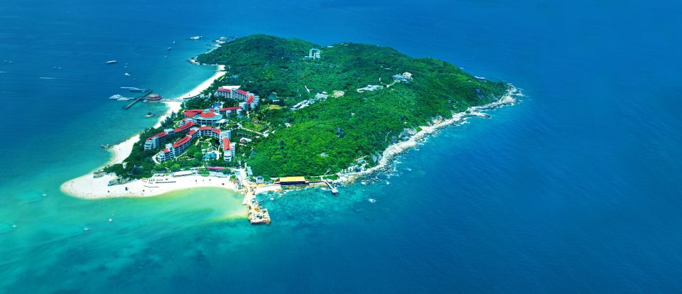 Wuzhizhou Island with its pristine white sand beaches and clear turquoise waters.