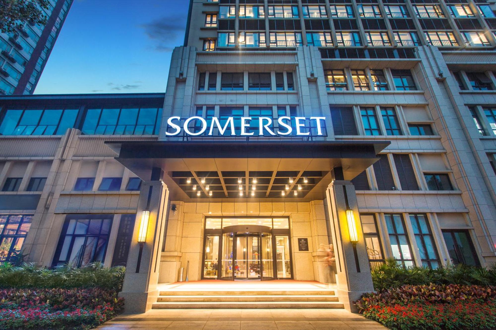 The modern exterior of Somerset Yangtze River Chongqing, an apartment hotel.