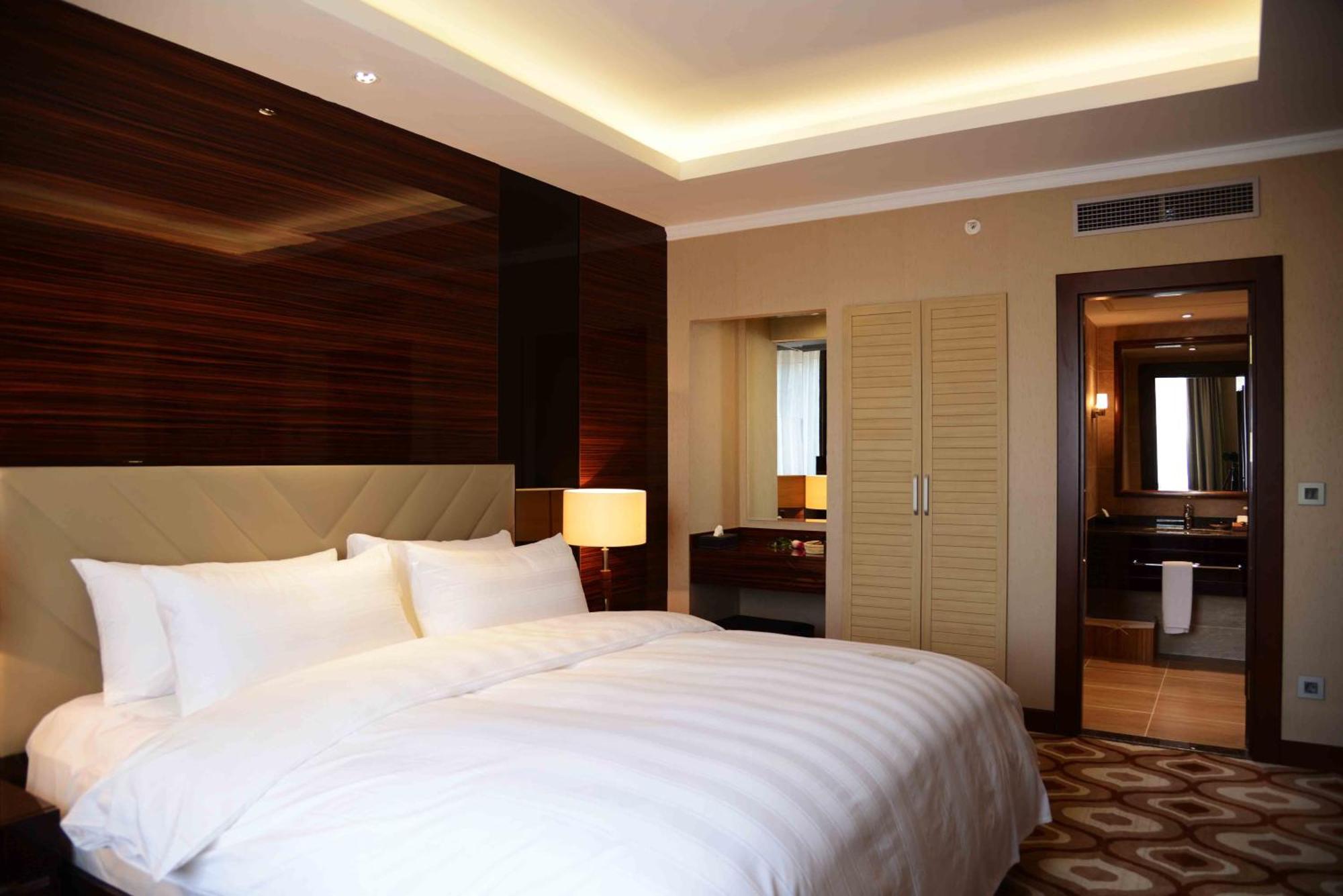 Hotel room at LOTTE City Hotels Tashkent Palace